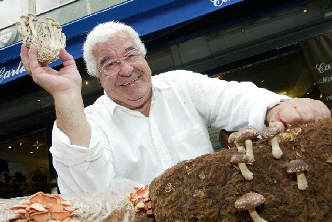 Antonio Carluccio showing off the mushrooms